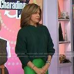 Hoda’s green cable knit sweater and satin slit skirt on Today