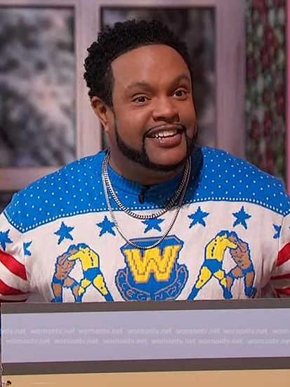 Jawn’s blue WWE wrestling sweater on Sherri