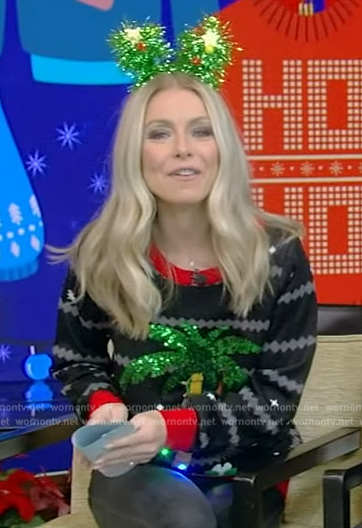 Kelly's black palm tree ugly Christmas sweater on Live with Kelly and Mark