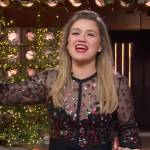 Kelly’s black sheer sequin embellished jumpsuit on The Kelly Clarkson Show