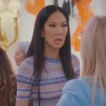 Kimora Lee Simmons’s blue stripe knit dress on Paris in Love