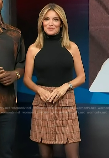 Kit's plaid mini skirt on Access Hollywood