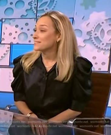 Kriss Karr’s black puff sleeve blouse on NBC News Daily