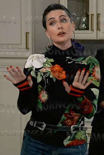 Lois’s floral turtleneck sweater, double buckle belt and gold earrings on General Hospital