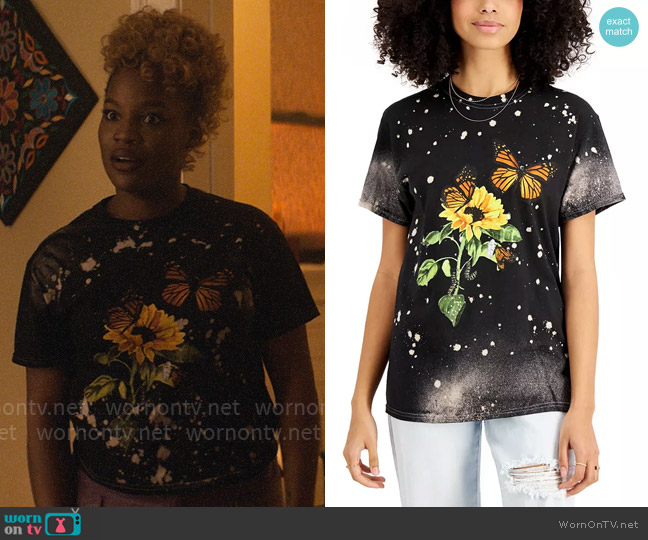 Malaika’s butterfly graphic t-shirt on The Other Black Girl