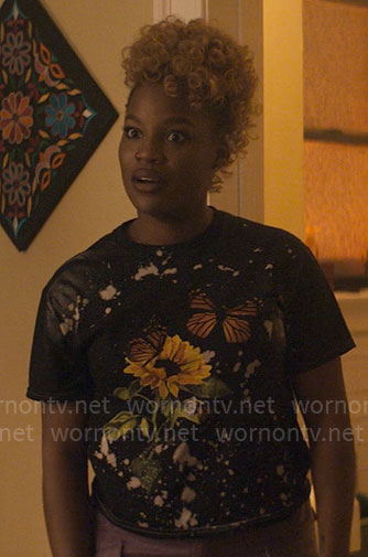 Malaika's butterfly graphic t-shirt on The Other Black Girl