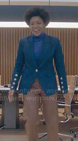 Nella's blue blazer with buttoned sleeves on The Other Black Girl