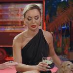 Nicole’s black one shoulder satin dress on The Real Housewives of Miami