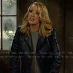 Nikki’s dark blue leather trench coat on The Young and the Restless