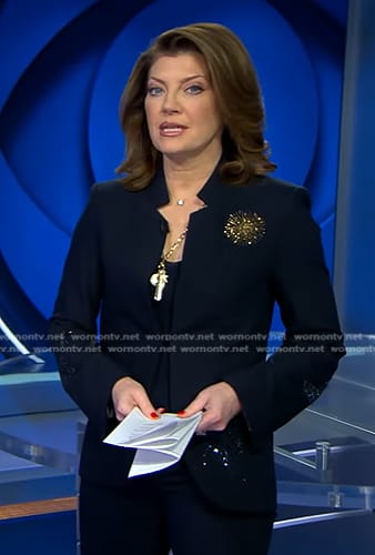 Norah's navy embellished jacket on CBS Evening News