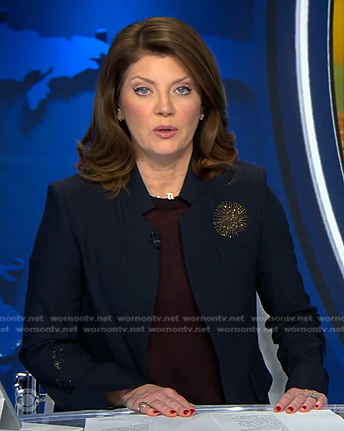 Norah’s navy embellished jacket on CBS Evening News