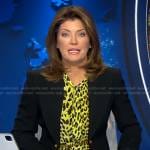 Norah’s yellow leopard blouse and black chain embellished blazer on CBS Evening News