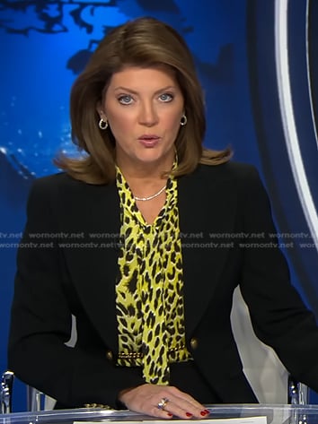 Norah’s yellow leopard blouse and black chain embellished blazer on CBS Evening News