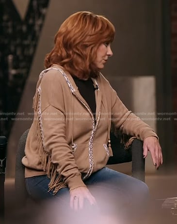 Reba McEntire's beige fringed hooded cardigan on The Voice