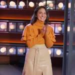 Sara Bareilles’s orange ruffle sweater and leather skirt on The Kelly Clarkson Show