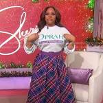 Sherri’s Oprah sweatshirt and plaid skirt on Sherri