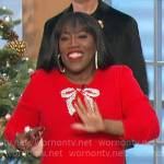 Sheryl’s red embellished bow sweater on The Talk