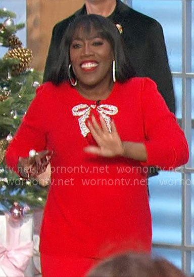 Sheryl's red embellished bow sweater on The Talk