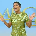 Tamron’s green floral jacquard mini dress on Tamron Hall Show