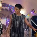 Tamron’s black crystal embellished mini dress on Tamron Hall Show