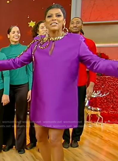 Tamron’s purple bow embellished mini dress on Tamron Hall Show