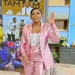 Tamron’s pink metallic suit and white lace corset om Tamron Hall Show