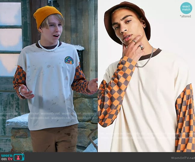 ASOS Oversized long sleeve T-shirt in off-white with check print sleeves worn by Jake (Luke Busey) on Bunkd