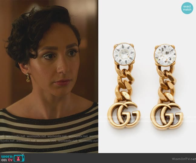 Gucci GG crystal-embellished drop earrings worn by Anna (Lauren Patten) on Death and Other Details