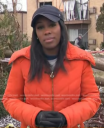 Adrienne Broaddus's orange down coat on NBC News Daily