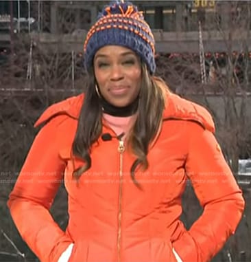 Adrienne Broaddus’s orange down coat on NBC News Daily