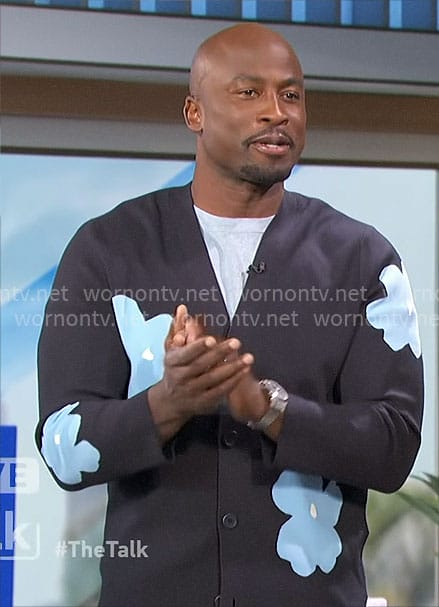 Akbar’s blue flower print cardigan on The Talk