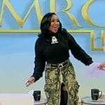 Bethany Gaskin’s green printed skirt and sweater on Tamron Hall Show