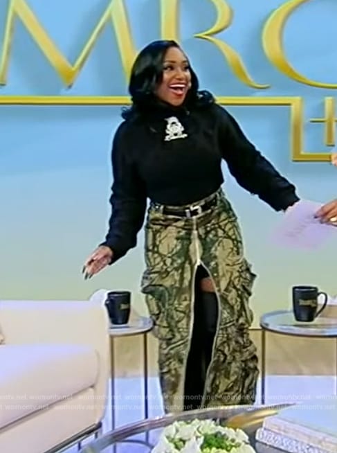 Bethany Gaskin's green printed skirt and sweater on Tamron Hall Show