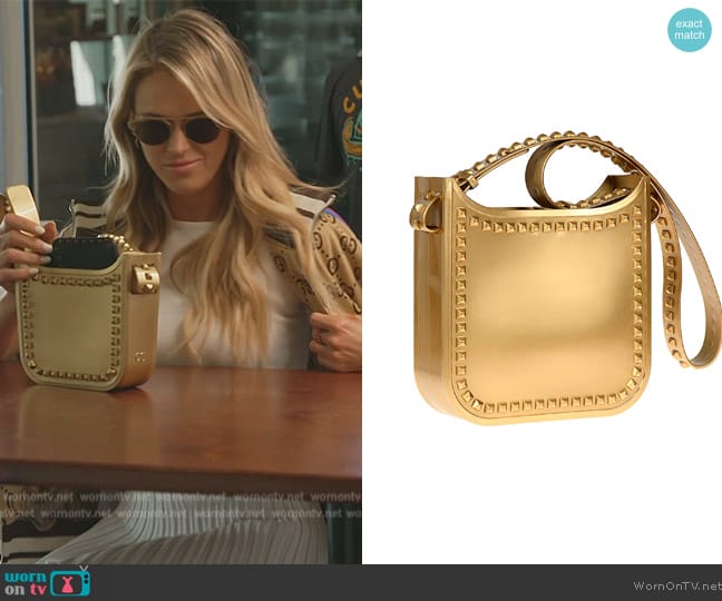 Olivia’s gold metallic bag on Southern Charm