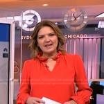 Christine Romans’ red ruffle neck blouse on NBC News Daily