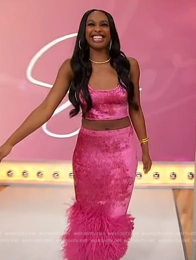 Coco Jones's pink velvet feather trim skirt and top on Sherri