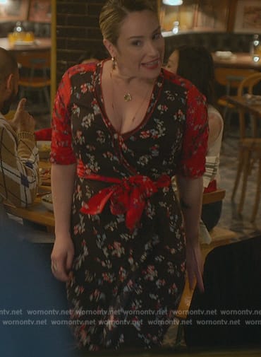 Davia's black floral print wrap dress on Good Trouble