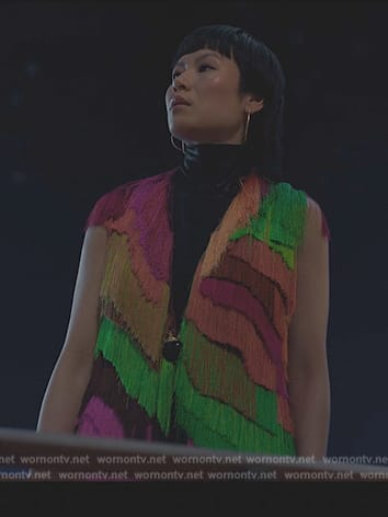 Eleanor's colorful fringed vest on Death and Other Details