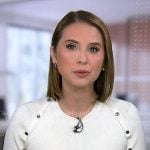 Elizabeth's white button trim top on Good Morning America