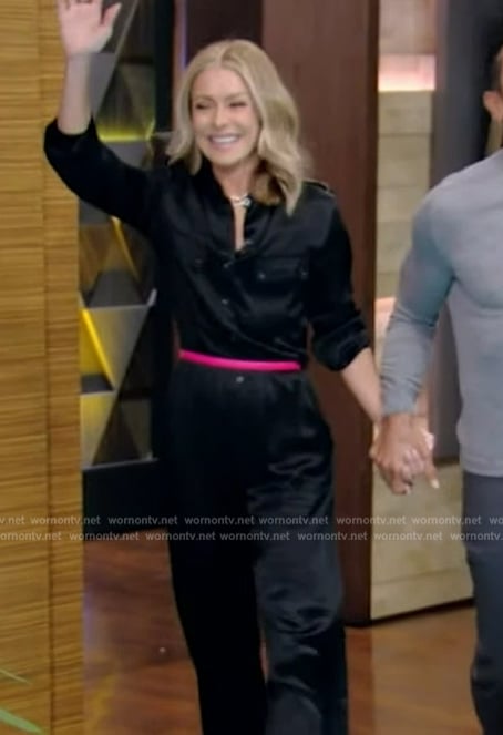 Kelly's black satin jumpsuit and yellow pumps on Live with Kelly and Mark