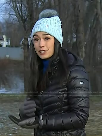Emilie's black quilted jacket and blue beanie on Today