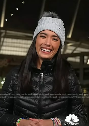 Emilie's black quilted jacket and blue beanie on Today