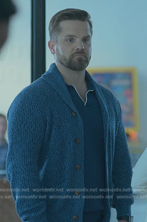 Evan's blue knit cardigan on Good Trouble