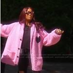 Garcelle’s pink knit cardigan and combat boots on The Real Housewives of Beverly Hills