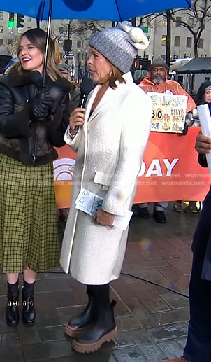 Hoda's white coat and chunky boots on Today