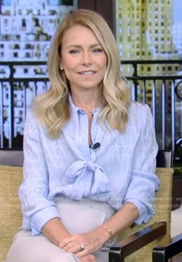 Kelly’s blue printed tie neck blouse on Live with Kelly and Mark