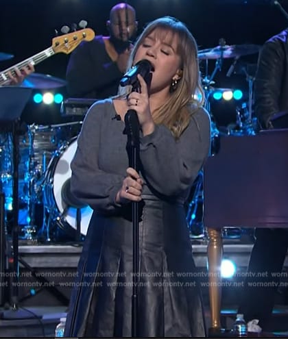 Kelly’s gray scoop neck sweater and leather skirt on The Kelly Clarkson Show