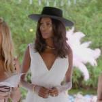 Kiki’s white textured v-neck dress on The Real Housewives of Miami