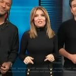 Kit’s black pants with gold buttons on Access Hollywood