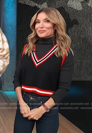 Kit’s black stripe trim vest on Access Hollywood